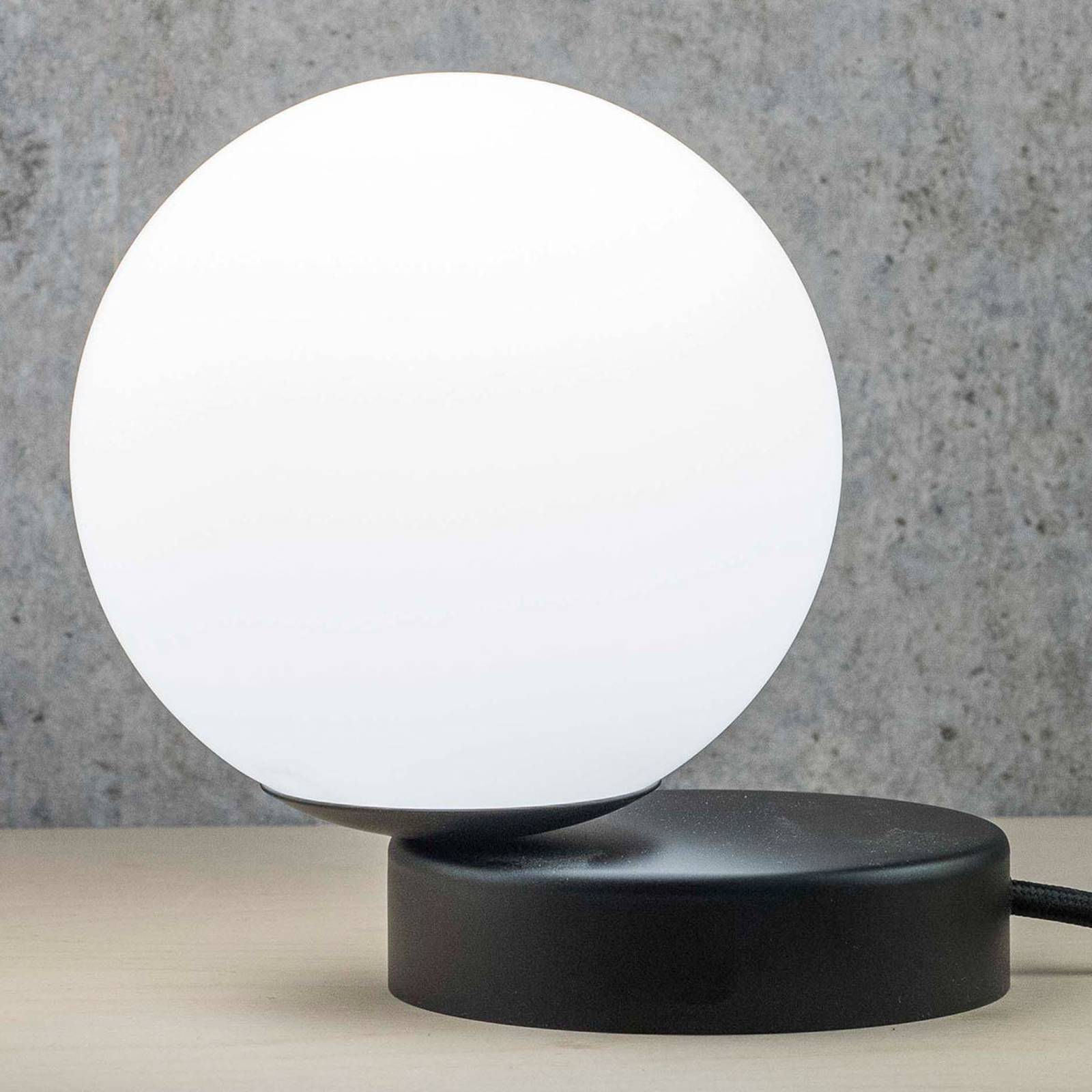 Stolní lampa Lumi kulatá černá